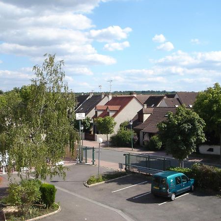 Kyriad Direct Acheres Exterior photo
